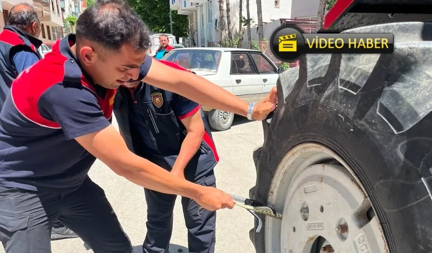 Traktöre giren yılan itfaiye ekiplerini harekete geçirdi